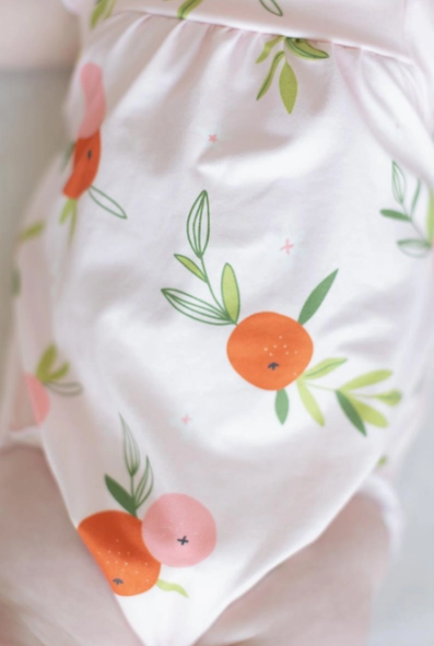 Tangerine Ruffle Cross Back Romper