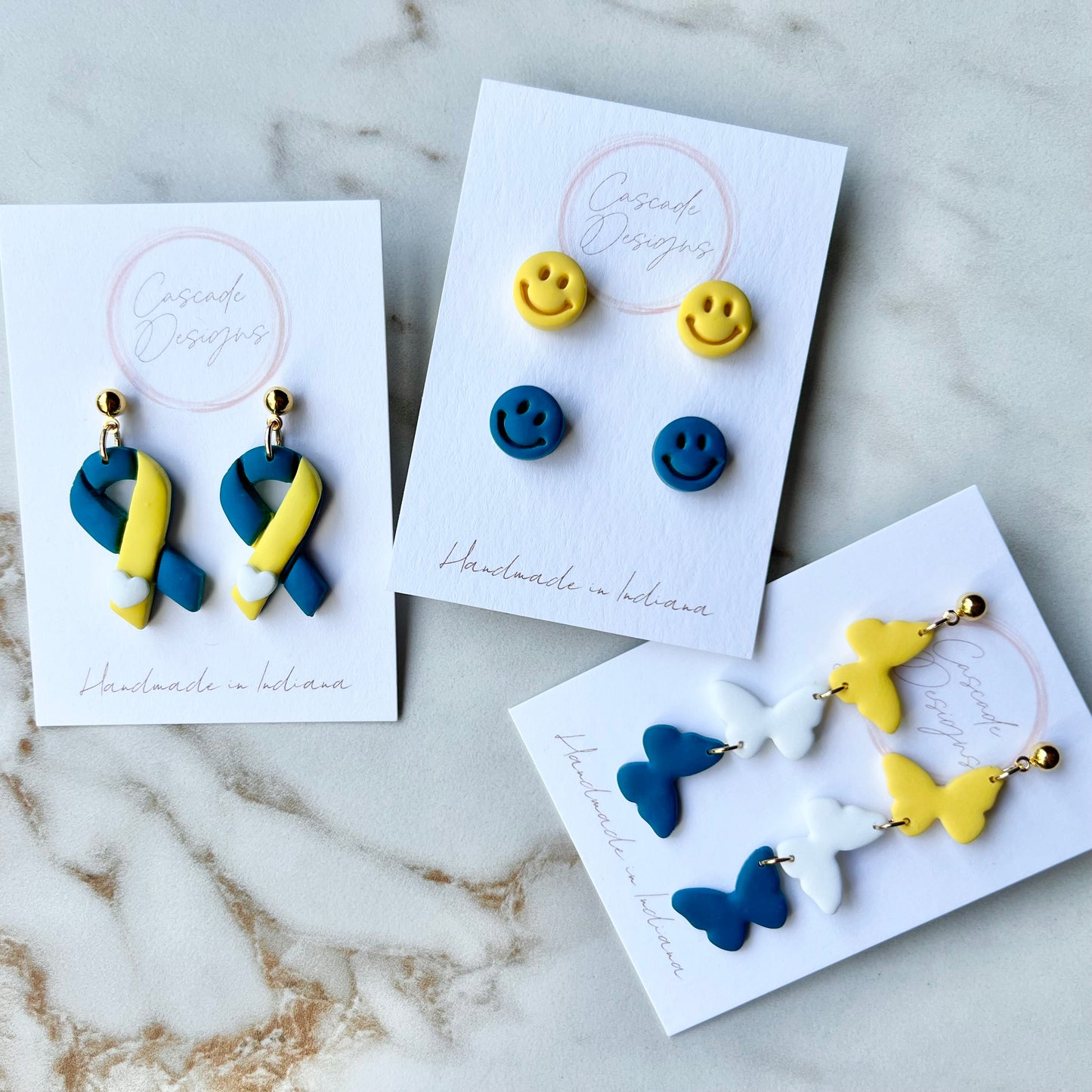 The SMILE | SMILE on Down Syndrome Earring Collection