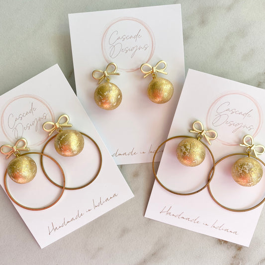 The Noelle | Gold Flake Ball and Bow Hoop Clay Earrings